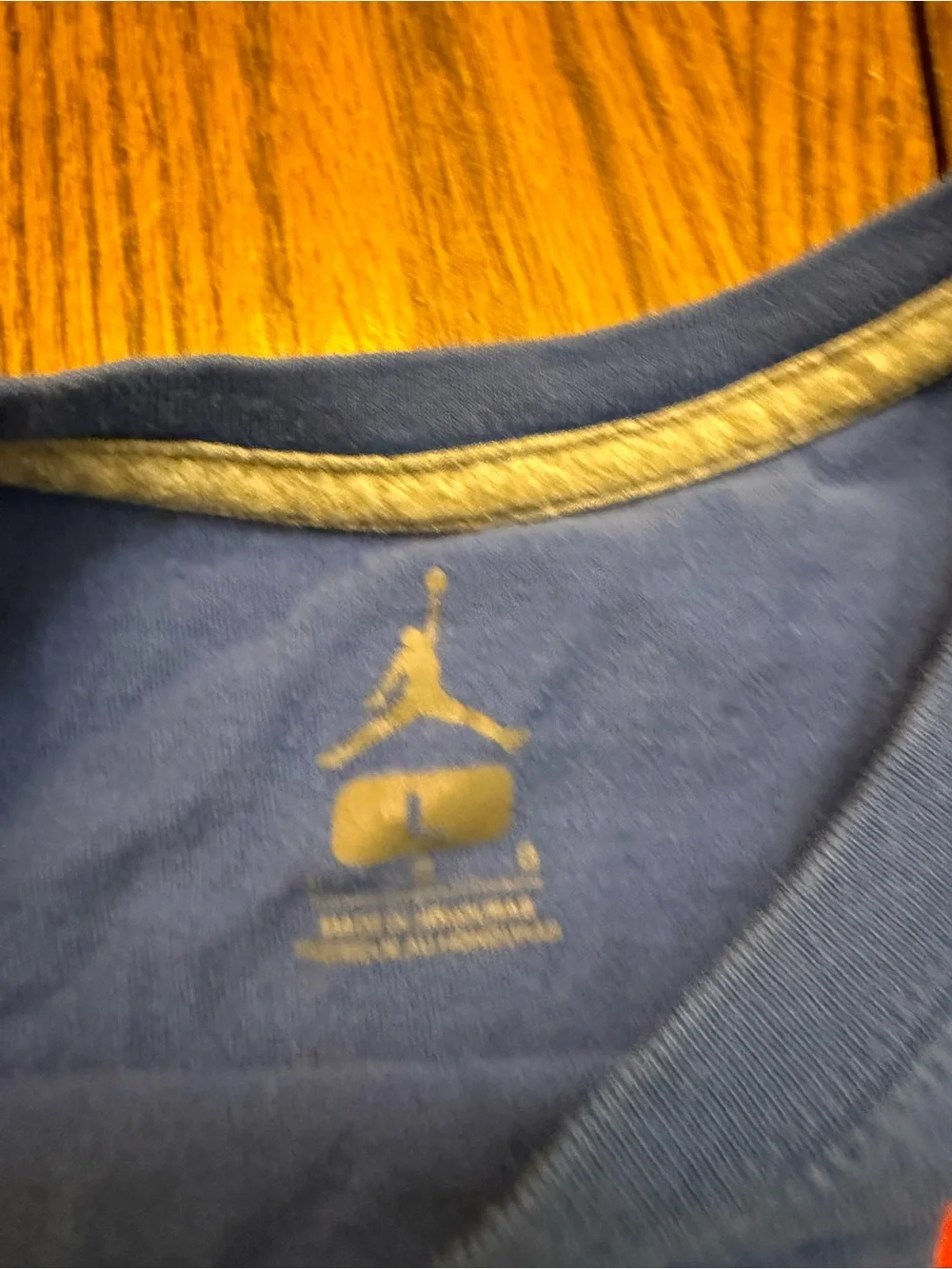 Jordan Blue Tee with Orange Jumpman Detail
